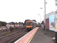 An Edinburgh - Dunblane train draws to a halt at Linlithgow.<br><br>[Brian Forbes 8/10/2006]