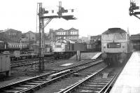 Aberdeen, November 1972. A class 40 stands with a parcels train on platform 8 while a 47 prepares to leave platform 6 with a southbound service.<br><br>[John McIntyre /11/1972]