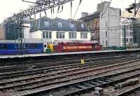 37417 hauls away the Caledonian Sleeper from Glasgow Central<br><br>[Graham Morgan 02/10/2006]