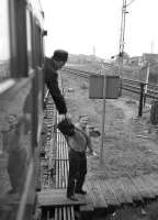 Handing back the token at Dyce after returning from Fraserburgh with the Buchan Belle railtour on 01 June 1974.<br><br>[John McIntyre 01/06/1974]