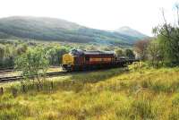 Unusually, the Mossend - Fort William Junction Yard train was hauled by a 37.<br><br>[Ewan Crawford 04/10/2006]