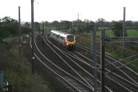 A northbound Voyager hits a sudden squall as it passes the Quintinshill loops on the morning of 12 October 2006, the infamous box long gone. <br><br>[John Furnevel 12/10/2006]