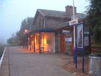 Ardgay at dusk on a foggy evening.The main building is a private house. 16/10/06<br><br>[John Gray 16/10/2006]