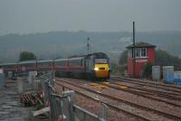 A 125 from Edinburgh runs north through Larbert Junctions new layout.<br><br>[Ewan Crawford 17/10/2006]