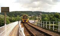 Class 158 crossing the Tay approaching Perth station in August 1992 with a Dundee - Glasgow service.<br><br>[John McIntyre 10/08/1992]