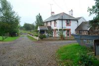 The stationhouse at Troutbeck. View looks east. The goods yard is straight ahead and the island platform was off to the right beyond the building.<br><br>[Ewan Crawford 27/09/2006]