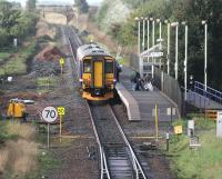 A Carlisle - Glasgow Central service shortly after arrival at Gretna Green on 12 October 2006, with preparatory work underway in connection with the redoubling of the section to Annan.<br><br>[John Furnevel 12/10/2006]