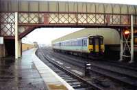 A 156 stands in the rain at Stranraer Harbour on 28 April 1990.<br><br>[John McIntyre 28/04/1990]