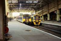 Early 1990s at Waverley. A 150 service departs for Dunblane while a 158 waits with a Glasgow Queen Street shuttle.<br><br>[John Mcintyre //]