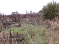 Remains of station, trackbed to the right. Rubble from signal box and small goods shed.<br><br>[Brian Forbes /10/2006]