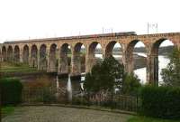 A London - Edinburgh train rumbles over the Royal Border Bridge in October 2006 as it slows for the Berwick stop.<br><br>[John Furnevel 24/10/2006]