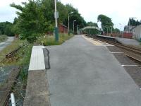 Arnside looking east. The disused platform to the left was for the Hincaster Branch to neat Oxenholme.<br><br>[Ewan Crawford 20/06/2003]