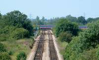 A GNER service flashes across Newark Crossing. This is the last flat crossing where a railway crosses a railway on the level in the UK.<br><br>[Ewan Crawford //]