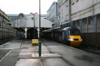 Aberdeen train at Waverley platform 21 on 22 October 2006. Platform 20 is out of use due to construction work (left background) in connection with the new through platform on the other side of the station wall.<br><br>[John Furnevel 22/10/2006]