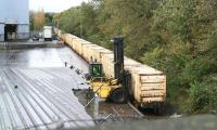 <I>That was rubbish!</I> Last of the refuse containers being loaded at Powderhall depot on 27 October onto the train which will form the recently introduced Friday afternoon <I>relief Binliner</I> to Oxwellmains.<br><br>[John Furnevel 27/10/2006]