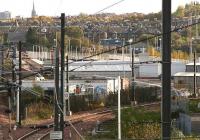 Looking west across Slateford yard from the footbridge at Slateford station on 29 October 2006. The new ScotRail cleaning and stabling roads can be seen above the buildings in the centre of the picture. The line in the foreground is the Slateford Jct - Craiglockhart Jct link.<br><br>[John Furnevel 29/10/2006]