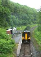 A DMU calls at Sandplace station on the Liskeard - Looe line in 1991. View south looking towards Looe. <br><br>[Ian Dinmore //1991]