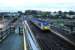 Londonderry service entering Antrim. In the background the (Bleach Green) line to Belfast passes under a roadbridge and to the right is the unused Crumlin route which passes very close to Belfast International Airport at Aldergrove.<br><br>[Ewan Crawford //]
