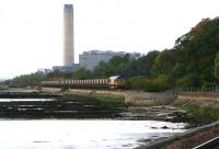 EWS 66088 leaving Longannet power station on 31 October 2006 and heading east along the Forth with coal empties returning to Hunterston via Halbeath Sidings and the Forth Bridge.<br><br>[John Furnevel 31/10/2006]