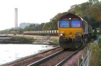 Longannet - Hunterston coal empties eastbound along the north shore of the Forth on 31 October 2008 approaching Culross behind EWS 66088.<br><br>[John Furnevel 31/10/2006]