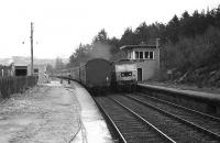 Passing trains at Tomatin - April 1979.<br><br>[John McIntyre /04/1979]