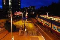 Dalmuir looking west. An Yoker bound train site next to a train in the terminal platform put in the for Argyle Line. <br><br>[Ewan Crawford 04/11/2006]