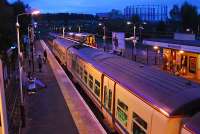 Dalmuir train arrives at Anniesland with a QSHL train having just terminated at platform 3.<br><br>[Ewan Crawford 04/11/2006]