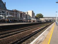 Seemingly hundreds of people pour off a District Line train and head for the exit to the adjacent Olympia exhibition halls.<br><br>[Michael Gibb 04/11/2006]