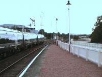 Inverness train accelerated northwards, in the gloom.<br><br>[Brian Forbes /09/2006]