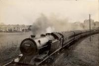 Glasgow - Ayr Express approaching Crookston. G&SW 4.6.4T 15405. Summer 1935.<br><br>[G H Robin collection by courtesy of the Mitchell Library, Glasgow //1935]