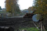 Looking west on the trackbed of the closed Stirling and Dunfermline Railway. The trackbed of the re-opening line to Kincardine is to the left and the line will continue along the S&DR route to pass under the new distant bridge.<br><br>[Ewan Crawford 12/11/2006]