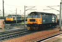 Two radio control fitted un-named class 47/4s sit in the up yard,awaiting next duties. The grey DMU is a precursor of the more modern yellow NMT sets.<br><br>[Brian Forbes //1988]