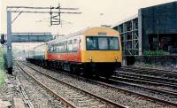 Four vehicles from Corkerhill (CK) arrive through Barnhill. They will reverse shunt at Sighthill East Junction to access St.Rollox Works (ZH).<br><br>[Brian Forbes //1989]