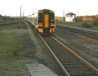 A late afternoon Aberdeen - Inverness train leaves Inverurie on 6 November 2006 and heads north west towards Inveramsay.<br><br>[John Furnevel 06/11/2006]