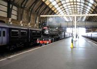 4771 arrives at Kings Cross with an NRM charter from York.<br><br>[Michael Gibb 18/11/2006]