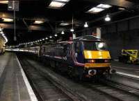 In Scotrail colours 90024 has brought in <i>The Royal Highlander</i> from Inverness with portions from Aberdeen and Fort William.<br><br>[Michael Gibb 18/11/2006]