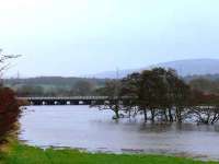 Close up scene of flood water threatening Strathearn Viaduct. Network Rail on watch here.<br><br>[Brian Forbes 20/11/2006]