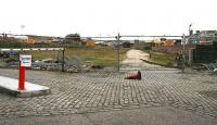 Guild Street, Aberdeen, looking south in November 2006 with the station over to the right. Most of the old yard is now out of use although container and other traffic is still handled at the south end (left background). Current plans for alternative freight handling facilities at Raiths Farm near Dyce, with container traffic moving to Craiginches, would release the Guild Streeet site for redevelopment.<br><br>[John Furnevel 05/11/2006]