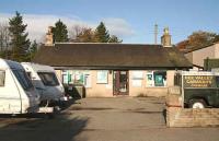 The surviving station building at Park on the Deeside line, photographed looking north in November 2006. The site is now occupied by a caravan sales company.<br><br>[John Furnevel 09/11/2006]