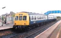 101.317 pauses at Bishopbriggs on its way to Falkirk Grahamston in June 1988. <br><br>[Brian Forbes /06/1988]