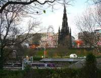 As another train leaves Waverley for Glasgow Queen Street, Edinburgh kicks off another festival... 25 November 2006.<br><br>[John Furnevel 25/11/2006]