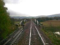 Grab shot of Earn viaduct looking from south of Hilton Junction towards Bridge of Earn in October 2006 showing termination of the former up line.<br><br>[Gary Straiton /10/2006]