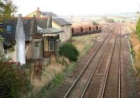 View north over Laurencekirk station in November 2006. Behind the station stands the large goods shed and to the north lie passing loops, a signal box and the entrance to the goods yard, occupied at that time by 2 trainloads of pipes.<br><br>[John Furnevel 11/11/2006]