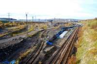 Re-development of the Tinsley Marshalling Yard site begins with the re-laying of the sidings to the north of the site. The rest is to be cleared for an industrial estate with excellent rail links. The connection to the steelworks will be relaid further west.<br><br>[Ewan Crawford 18/11/2006]