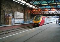 The 1205 Voyager to Plymouth on 6 December 2006 stands opposite the hole in the wall on the new Klondyke platform. The hole will provide access to the cross-station walkway in the background via a new stairway on the other side.<br><br>[John Furnevel 06/12/2006]