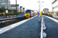 The 0755 Inverness - Kings Cross <I>'Highland Chieftain'</I> runs into platform 1 at Haymarket on 6 December 2006 with the under construction bay platform 0 on the right.<br><br>[John Furnevel 06/12/2006]