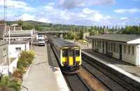 Inverness - Wick/Thurso service at Dingwall on 15 August 1989 looking north.<br><br>[John McIntyre 15/08/1989]