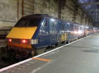 91114 St Mungo Cathedral sitting at Glasgow Central waiting to power the 0800 GNER service to London Kings Cross.<br><br>[Graham Morgan 09/12/2006]