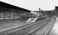 Looking south from platform 9 in February 1973. A Swindon Cross-country set for Inverness stands at platform 6 (north) with demolition work underway all around. Note the buffer stops at the end of platform 7 which was truncated at that time.<br><br>[John McIntyre /02/1973]