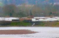 Secret of viaduct covering revealed during storm. New masonary walls? Wind gusting at 70mph. Torrential rain! The large building is Strathallan School.<br><br>[Brian Forbes 14/12/2006]